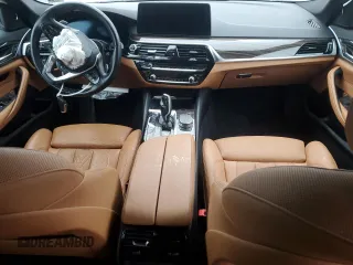 2021 BMW 5 Series 530i xDrive z VIN WBA13BJ03MCG98761, wystawiony jako Copart lot #56557135 z przebiegiem Nie podano mil oraz Szkoda całkowita • Salvage title. Historia ofert i sprzedaży dostępna na DreamBid. Obrazek 8.