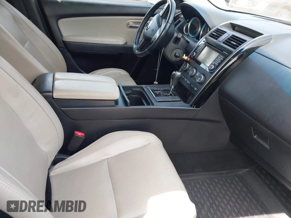 2014 Mazda CX-9 Touring with VIN JM3TB3CV8E0441535, listed as a IAAI auction lot 42355526 with 155,826 mi miles and . Bid and sale history available at DreamBid. Image 5.