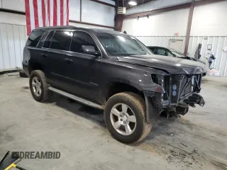 2015 Chevrolet Tahoe LT with VIN 1GNSCBKC3FR112306, listed as a Copart auction lot 51282355 with 136,492 mi miles and Salvage Title. Bid and sale history available at DreamBid. Image 4.