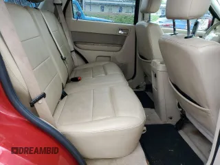 2010 Ford Escape Limited with VIN 1FMCU0E71AKB54080, listed as a Copart auction lot 55175795 with 246,064 mi miles and Salvage title. Bid and sale history available at DreamBid. Image 11.