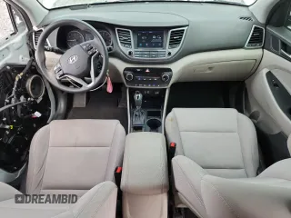 2018 Hyundai Tucson SEL Plus z VIN KM8J33A41JU670631, wystawiony jako Copart lot #59887105 z przebiegiem 133 012 mil mil oraz Szkoda całkowita • Salvage title. Historia ofert i sprzedaży dostępna na DreamBid. Obrazek 8.