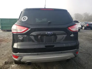 2014 Ford Escape SE with VIN 1FMCU9GX2EUC86115, listed as a Copart auction lot 82810324 with 212,346 mi miles and Salvage Title. Bid and sale history available at DreamBid. Image 6.