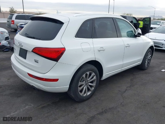 2016 Audi Q5 Premium with VIN WA1C2AFP9GA018285, listed as a IAAI auction lot 40931565 with 68,743 mi miles. Bid and sale history available at carsss.com. Image 4.