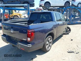 2020 Honda Ridgeline RTL with VIN 5FPYK3F56LB028917, listed as a IAAI auction lot 42280770 with 17,598 mi miles and . Bid and sale history available at DreamBid. Image 4.