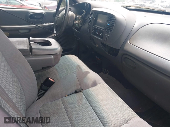 2002 Ford F-150 XL with VIN 2FTRX18W22CA23065, listed as a IAAI auction lot 42128001 with 262,452 mi miles and . Bid and sale history available at DreamBid. Image 5.