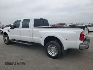 2010 Ford F-450 with VIN 1FTXW4CR9AEA96908, listed as a Copart auction lot 60075265 with 124,396 mi miles and Clean title. Bid and sale history available at DreamBid. Image 2.