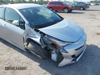 2017 Toyota Prius Two z VIN JTDKARFU8H3046058, wystawiony jako IAAI lot #42169692 z przebiegiem 79 226 mil mil oraz . Historia ofert i sprzedaży dostępna na DreamBid. Obrazek 6.