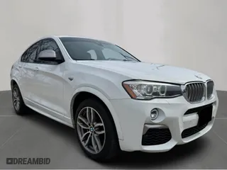 2018 BMW X4 M40i with VIN 5UXXW7C52J0W64992, listed as a Copart auction lot 53578695 with 97,697 mi miles and Clean Title. Bid and sale history available at carsss.com. Image 1.