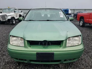 1999 Volkswagen Jetta z VIN 3VWSC29M1XM015418, wystawiony jako Copart lot #75756904 z przebiegiem 195 604 mil mil oraz Szkoda całkowita • Salvage title. Historia ofert i sprzedaży dostępna na DreamBid. Obrazek 5.
