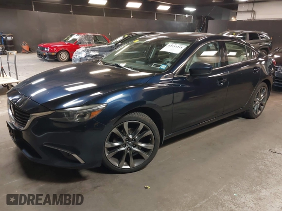 2017 Mazda 6 Grand Touring with VIN JM1GL1W51H1101519, listed as a IAAI auction lot 42132215 with 145,796 mi miles. Bid and sale history available at carsss.com. Image 17.
