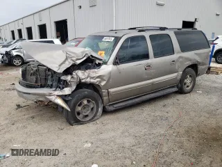 2002 Chevrolet Suburban LT z VIN 1GNEC16Z62J196409, wystawiony jako Copart lot #60517915 z przebiegiem Nie podano mil oraz Szkoda całkowita • Salvage title. Historia ofert i sprzedaży dostępna na DreamBid. Obrazek 1.