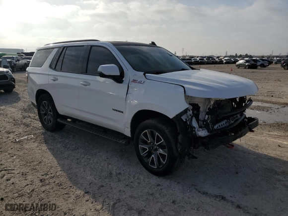 2021 Chevrolet Tahoe Z71 with VIN 1GNSKPKD3MR117317, listed as a Copart auction lot 49102285 with 130,976 mi miles and Salvage Title. Bid and sale history available at carsss.com. Image 4.