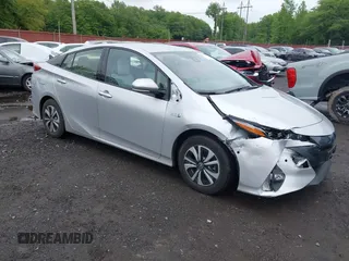 2017 Toyota Prius Plus z VIN JTDKARFPXH3034892, wystawiony jako IAAI lot #42376800 z przebiegiem 65 548 mil mil oraz . Historia ofert i sprzedaży dostępna na DreamBid. Obrazek 1.