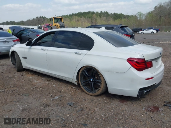 2015 BMW 7 Series 750Li with VIN WBAYE8C54FD780951, listed as a IAAI auction lot 41813038 with 103,131 mi miles. Bid and sale history available at carsss.com. Image 3.