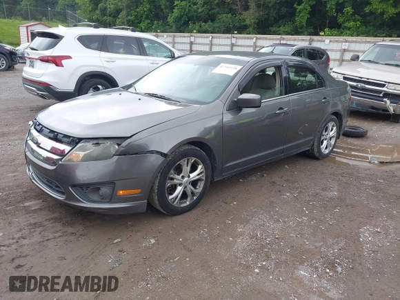 2012 Ford Fusion SE with VIN 3FAHP0HA1CR312687, listed as a IAAI auction lot 42342538 with 216,914 mi miles and . Bid and sale history available at DreamBid. Image 2.