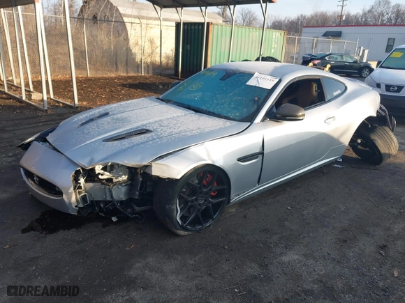 2014 Jaguar XK with VIN SAJWA4DC7EMB52199, listed as a IAAI auction lot 41191119 with 90,585 mi miles. Bid and sale history available at carsss.com. Image 17.