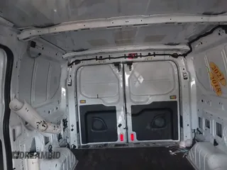 2017 Ford Transit z VIN 1FTYR1ZM7HKA42038, wystawiony jako IAAI lot #42348768 z przebiegiem Nie podano mil oraz . Historia ofert i sprzedaży dostępna na DreamBid. Obrazek 8.