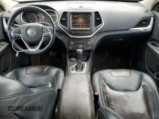 2016 Jeep Cherokee Limited with VIN 1C4PJMDS8GW106153, listed as a Copart auction lot 55576545 with 129,836 mi miles and Salvage title. Bid and sale history available at DreamBid. Image 8.