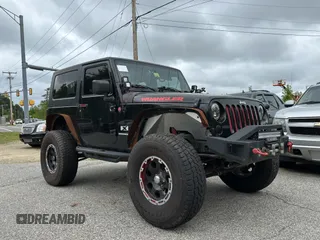 2008 Jeep Wrangler X z VIN 1J4FA24168L582227, wystawiony jako Copart lot #58219065 z przebiegiem 98 284 mil mil oraz Szkoda całkowita • Salvage title. Historia ofert i sprzedaży dostępna na DreamBid. Obrazek 1.