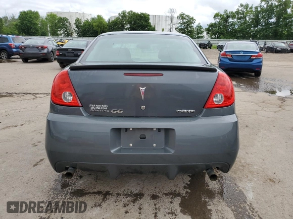 2009 Pontiac G6 GXP 1SA with VIN 1G2ZM577294217264, listed as a Copart auction lot 63824735 with 165,948 mi miles and Salvage title. Bid and sale history available at DreamBid. Image 6.