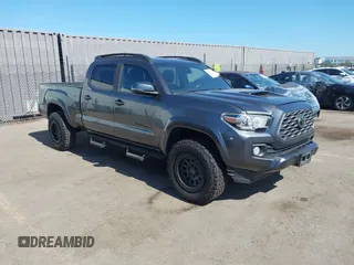 2020 Toyota Tacoma SR5 with VIN 3TMBZ5DN9LM025501, listed as a IAAI auction lot 42680028 with 109,404 mi miles and . Bid and sale history available at DreamBid. Image 1.
