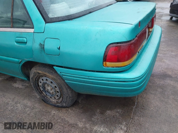 1994 Ford Escort z VIN 3FARP13J0RR121191, wystawiony jako IAAI lot #42202443 z przebiegiem 111 111 mil mil oraz . Historia ofert i sprzedaży dostępna na DreamBid. Obrazek 14.