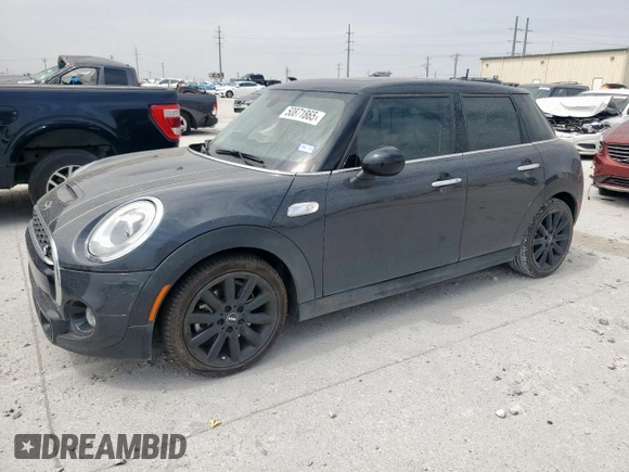 2016 MINI Hardtop 4 Door S with VIN WMWXU3C52G2D30894, listed as a Copart auction lot 50871865 with Not provided miles and Salvage title. Bid and sale history available at DreamBid. Image 1.