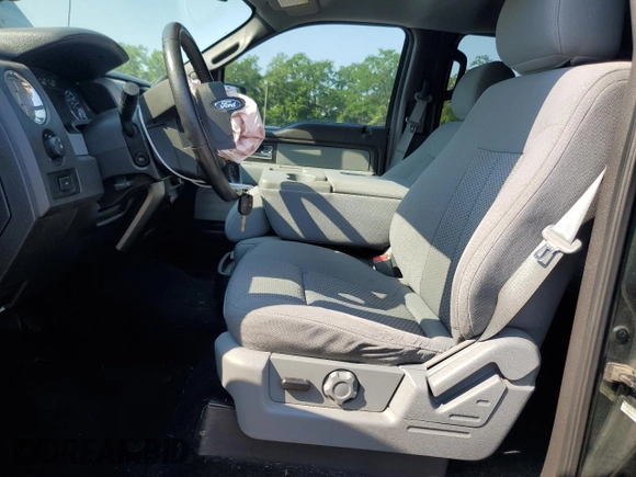 2012 Ford F-150 XL with VIN 1FTFW1EF1CKD27740, listed as a Copart auction lot 62552965 with 172,002 mi miles and Salvage title. Bid and sale history available at DreamBid. Image 7.
