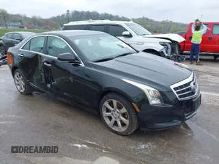 2014 Cadillac ATS Luxury AWD z VIN 1G6AH5SX0E0196052, wystawiony jako IAAI lot #41995886 z przebiegiem 97 531 mil mil oraz . Historia ofert i sprzedaży dostępna na DreamBid. Obrazek 1.