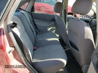 2006 Ford Focus S z VIN 1FAHP34N36W250236, wystawiony jako Copart lot #53794555 z przebiegiem 198 791 mil mil oraz Szkody całkowita. Historia ofert i sprzedaży dostępna na DreamBid. Obrazek 10.