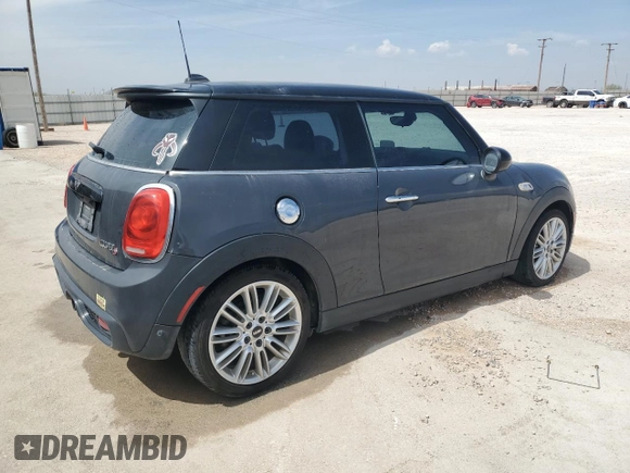 2014 MINI Hardtop S with VIN WMWXM7C50ET985583, listed as a Copart auction lot 50820675 with 75,759 mi miles and Clean Title. Bid and sale history available at DreamBid. Image 3.