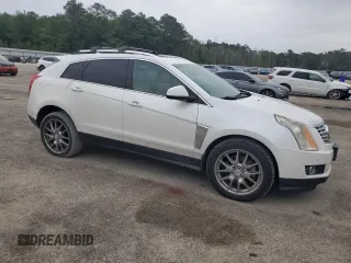 2013 Cadillac SRX Performance Collection z VIN 3GYFNHE33DS602428, wystawiony jako Copart lot #55688555 z przebiegiem 143 504 mil mil oraz Szkody całkowita. Historia ofert i sprzedaży dostępna na DreamBid. Obrazek 4.