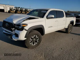 2022 Toyota Tacoma SR5 with VIN 3TYDZ5BN1NT014897, listed as a Copart auction lot 50320035 with 27,057 mi miles and Salvage title. Bid and sale history available at DreamBid. Image 1.
