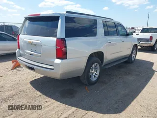 2017 Chevrolet Suburban LT with VIN 1GNSCHKC9HR287701, listed as a IAAI auction lot 42510491 with 166,568 mi miles and . Bid and sale history available at DreamBid. Image 4.