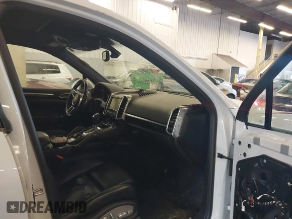 2016 Porsche Cayenne with VIN WP1AA2A26GLA10357, listed as a IAAI auction lot 41370956 with 96,026 mi miles. Bid and sale history available at carsss.com. Image 5.