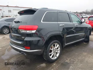 2015 Jeep Grand Cherokee Summit with VIN 1C4RJEJG3FC626002, listed as a IAAI auction lot 41295706 with 85,958 mi miles and . Bid and sale history available at DreamBid. Image 4.
