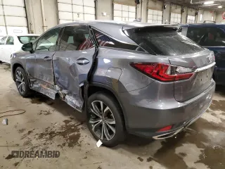 2022 Lexus RX with VIN 2T2HZMDA2NC323851, listed as a Copart auction lot 70025382 with 26,613 mi miles. Bid and sale history available at carsss.com. Image 2.
