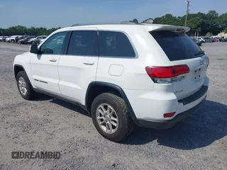 2020 Jeep Grand Cherokee Laredo E with VIN 1C4RJFAG1LC389026, listed as a IAAI auction lot 42261396 with 100,409 mi miles and . Bid and sale history available at DreamBid. Image 3.