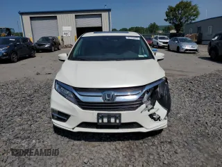 2019 Honda Odyssey Touring with VIN 5FNRL6H81KB051846, listed as a Copart auction lot 58723015 with 68,142 mi miles and Salvage title. Bid and sale history available at DreamBid. Image 5.