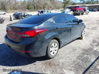 2016 Hyundai Elantra SE with VIN 5NPDH4AE4GH756150, listed as a IAAI auction lot 41600344 with 119,367 mi miles. Bid and sale history available at carsss.com. Image 4.
