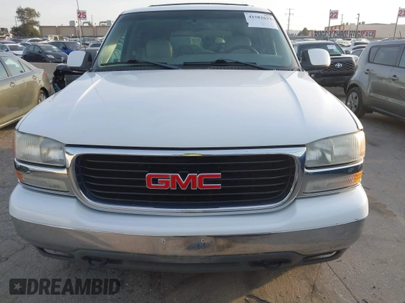 2001 GMC Yukon SLT with VIN 1GKEK13T41R171024, listed as a IAAI auction lot 41582633 with 216,077 mi miles. Bid and sale history available at carsss.com. Image 6.