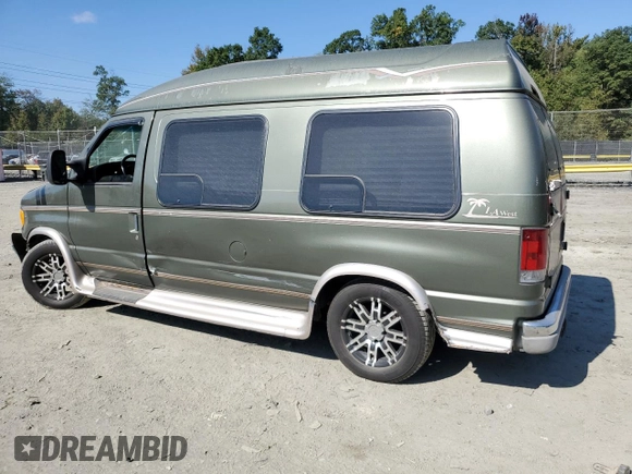 2002 Ford Econoline Cargo with VIN 1FDRE14W62HB15506, listed as a Copart auction lot 74686494 with 253,296 mi miles and Salvage Title. Bid and sale history available at DreamBid. Image 2.