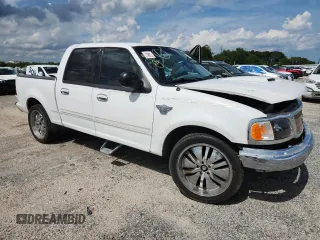 2001 Ford F-150 XLT with VIN 1FTRW07W71KE61878, listed as a Copart auction lot 60516665 with Not provided miles and Salvage title. Bid and sale history available at DreamBid. Image 4.