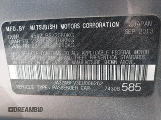 2014 Mitsubishi Lancer Evolution GSR with VIN JA32W8FV3EU008262, listed as a IAAI auction lot 41653902 with 128,977 mi miles. Bid and sale history available at carsss.com. Image 9.
