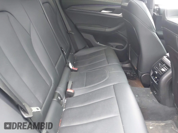 2023 BMW X4 xDrive30i with VIN 5UX33DT01P9N66552, listed as a IAAI auction lot 42103350 with 56,303 mi miles and . Bid and sale history available at DreamBid. Image 8.