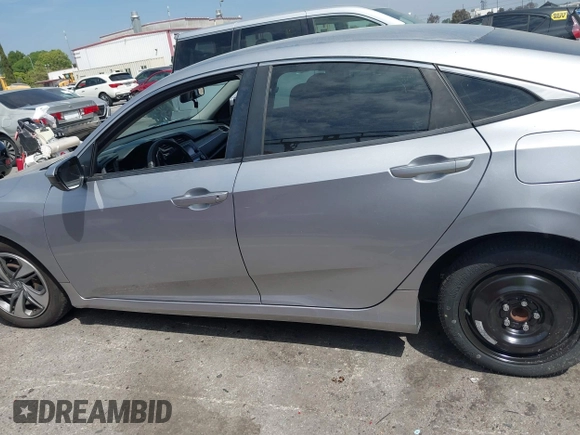 2019 Honda Civic Sedan LX with VIN 2HGFC2F61KH536965, listed as a IAAI auction lot 42030634 with 1 mi miles. Bid and sale history available at carsss.com. Image 14.
