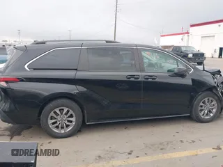 2022 Toyota Sienna LE z VIN 5TDKSKFC1NS042455, wystawiony jako IAAI lot #41921094 z przebiegiem 84 810 mil mil oraz . Historia ofert i sprzedaży dostępna na DreamBid. Obrazek 13.