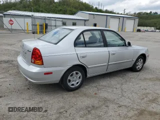 2004 Hyundai Accent GL with VIN KMHCG45C94U515186, listed as a Copart auction lot 52697284 with 49,236 mi miles and Salvage Title. Bid and sale history available at carsss.com. Image 3.