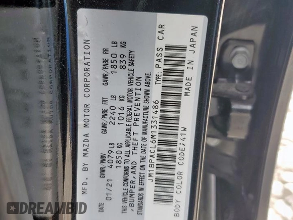 2021 Mazda 3 Preferred with VIN JM1BPACL6M1331486, listed as a Copart auction lot 60196775 with 67,682 mi miles and Salvage title. Bid and sale history available at DreamBid. Image 12.