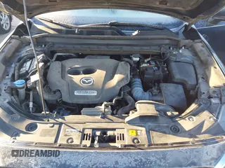 2019 Mazda CX-5 Signature with VIN JM3KFBEY5K0656965, listed as a IAAI auction lot 41421453 with 99,073 mi miles. Bid and sale history available at carsss.com. Image 10.